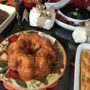 A table full of food and desserts on a table.