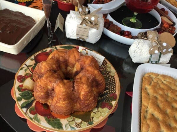 A table full of food and desserts on a table.