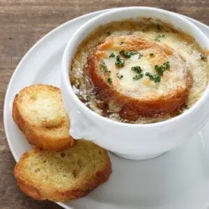 French onion soup in a white bowl.